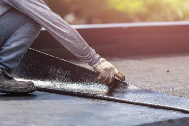 Professional Emergency Waterproofing technician working in Athens, IL